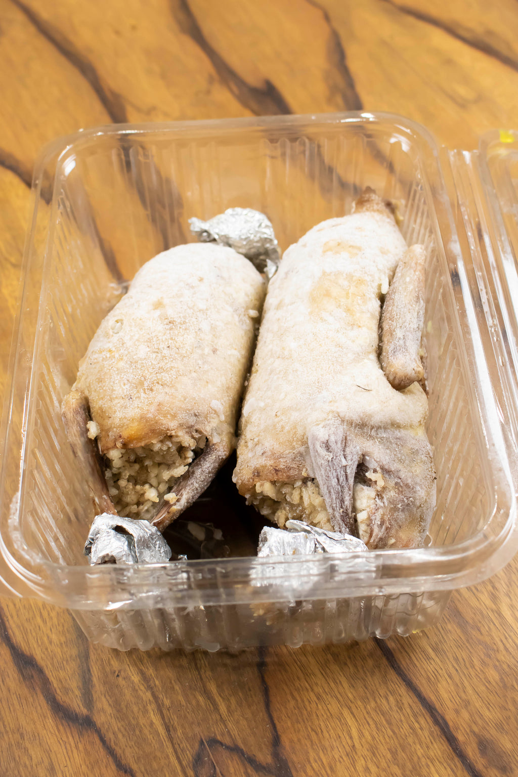 2 Stuffed Pigeons Ready for Browning with Broth