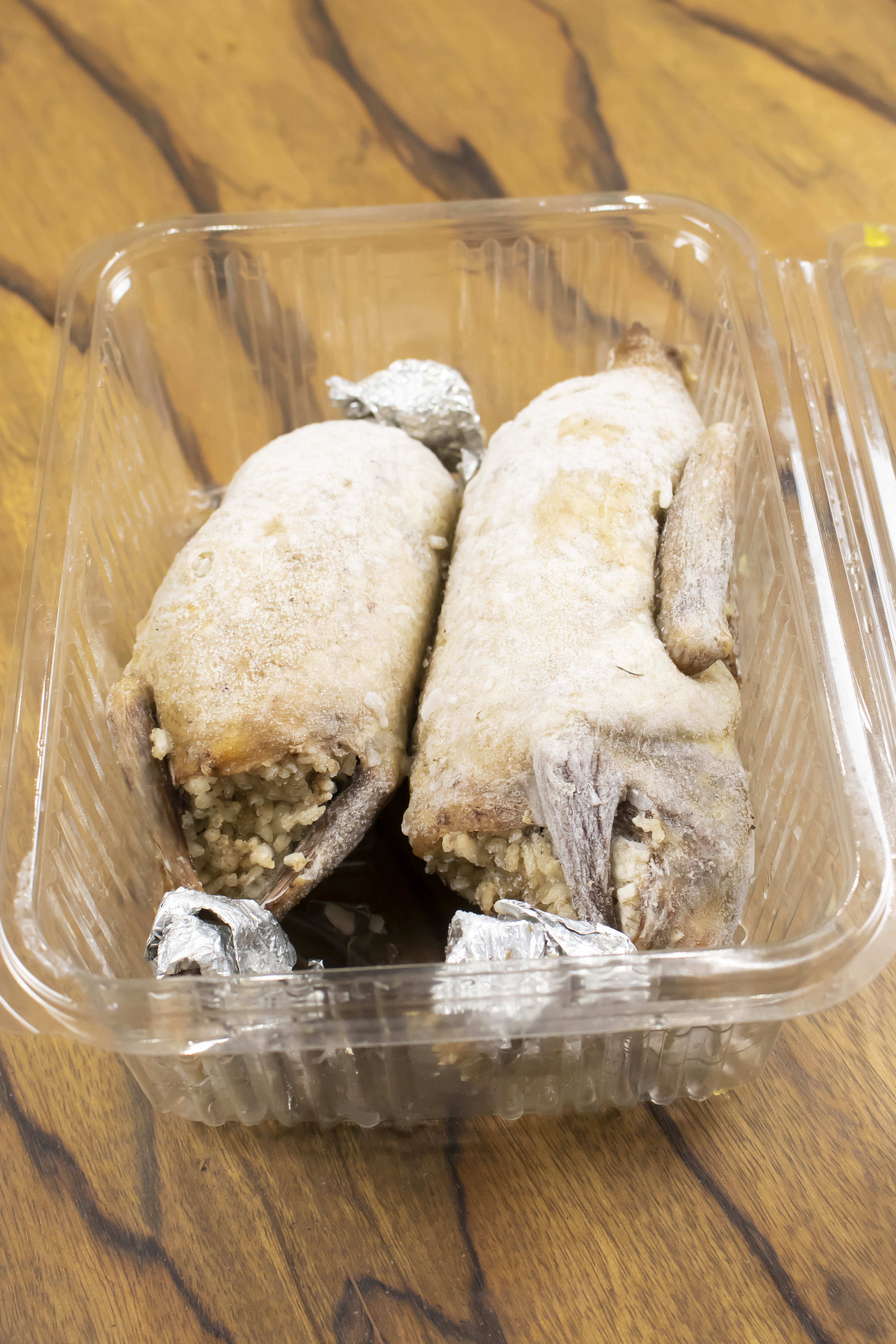 2 Stuffed Pigeons Ready for Browning with Broth
