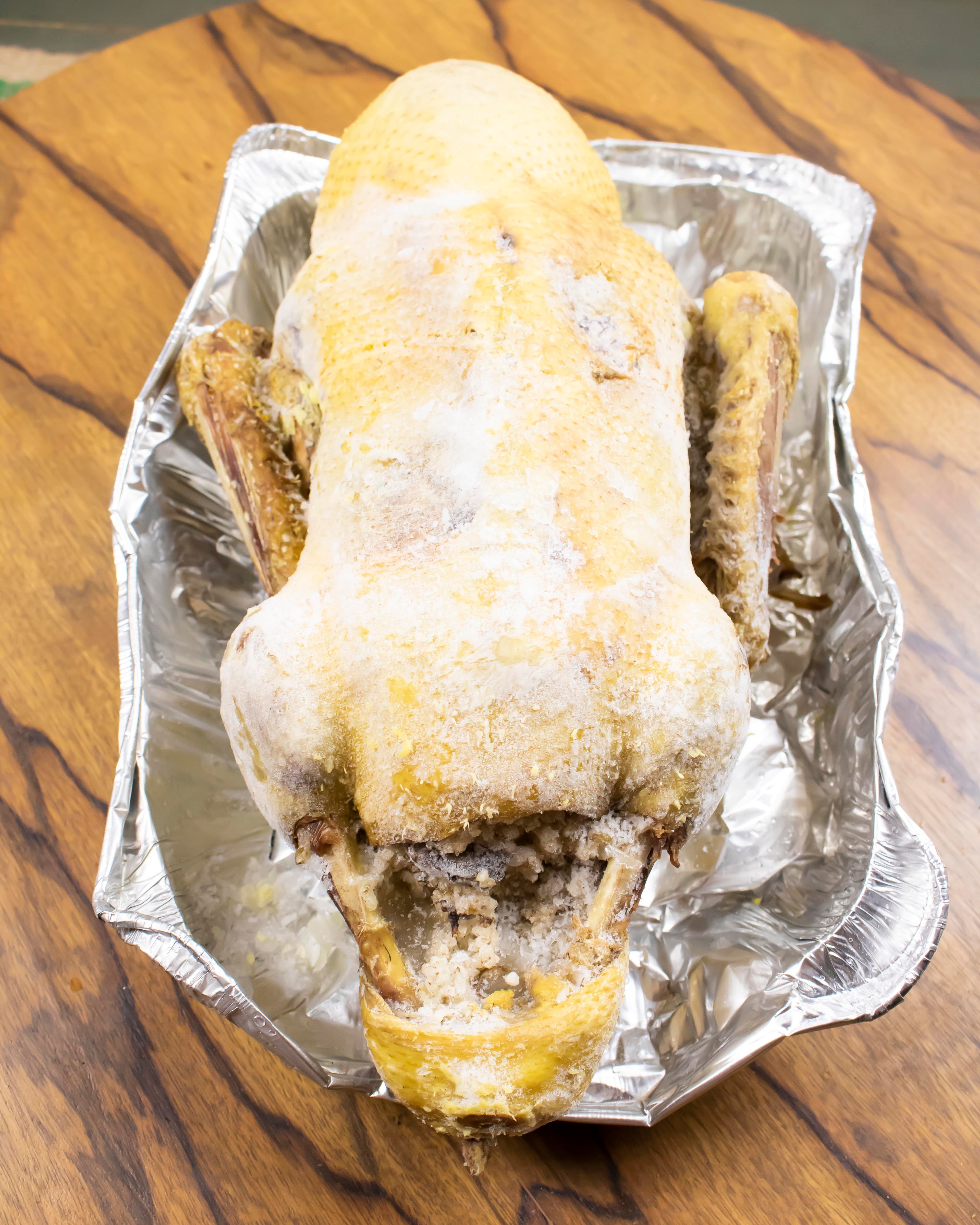 Stuffed Duck Ready for Browning with Broth