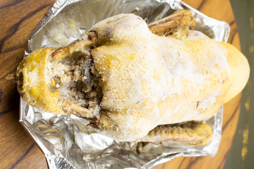 Stuffed Duck Ready for Browning with Broth