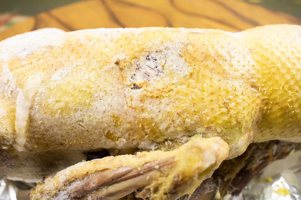 Stuffed Duck Ready for Browning with Broth