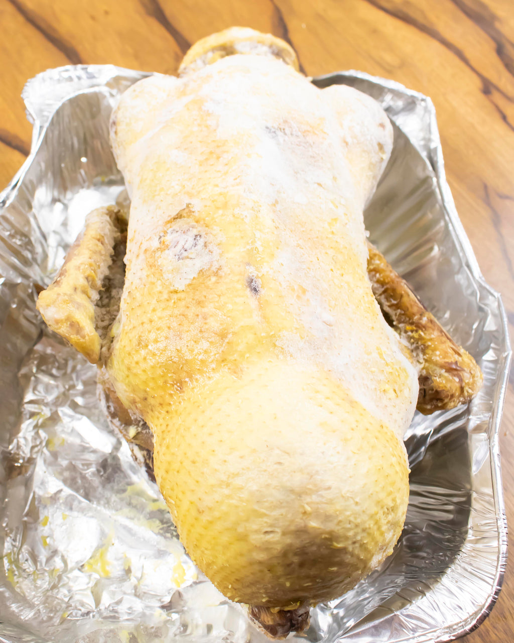 Stuffed Duck Ready for Browning with Broth