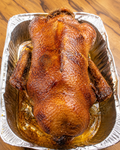 Stuffed Duck Ready for Browning with Broth